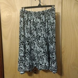 CJ Banks black skirt with white circles.